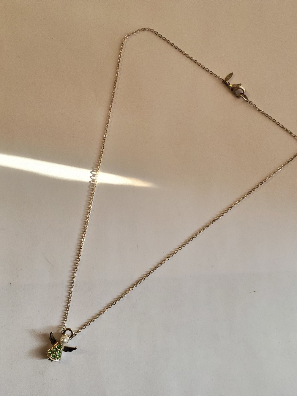 Silver Angel Necklace With Wings And Green Stones